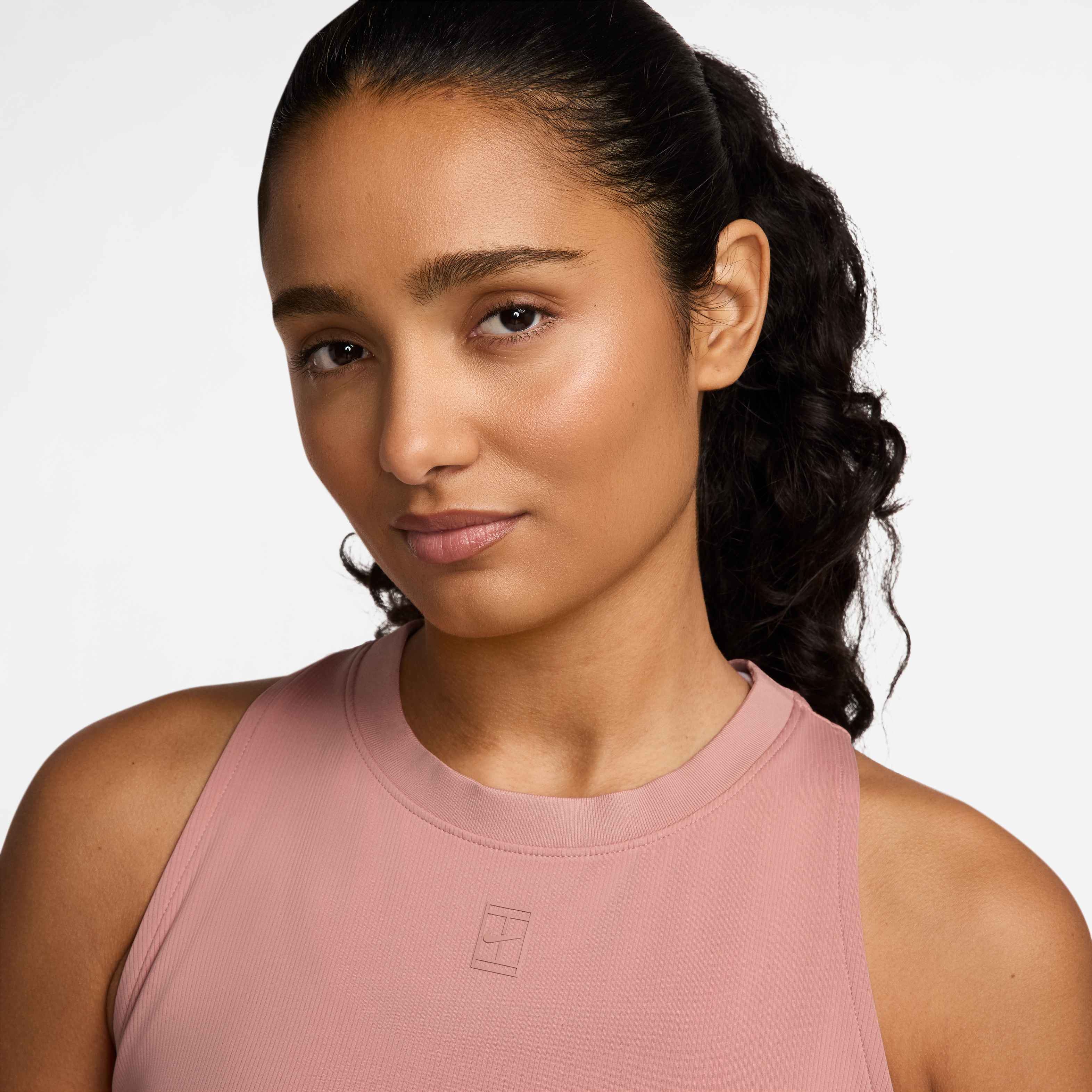 Nike Women's Court Advantage Dri-FIT Tennis Tank Top in Red Stardust/Red Stardust