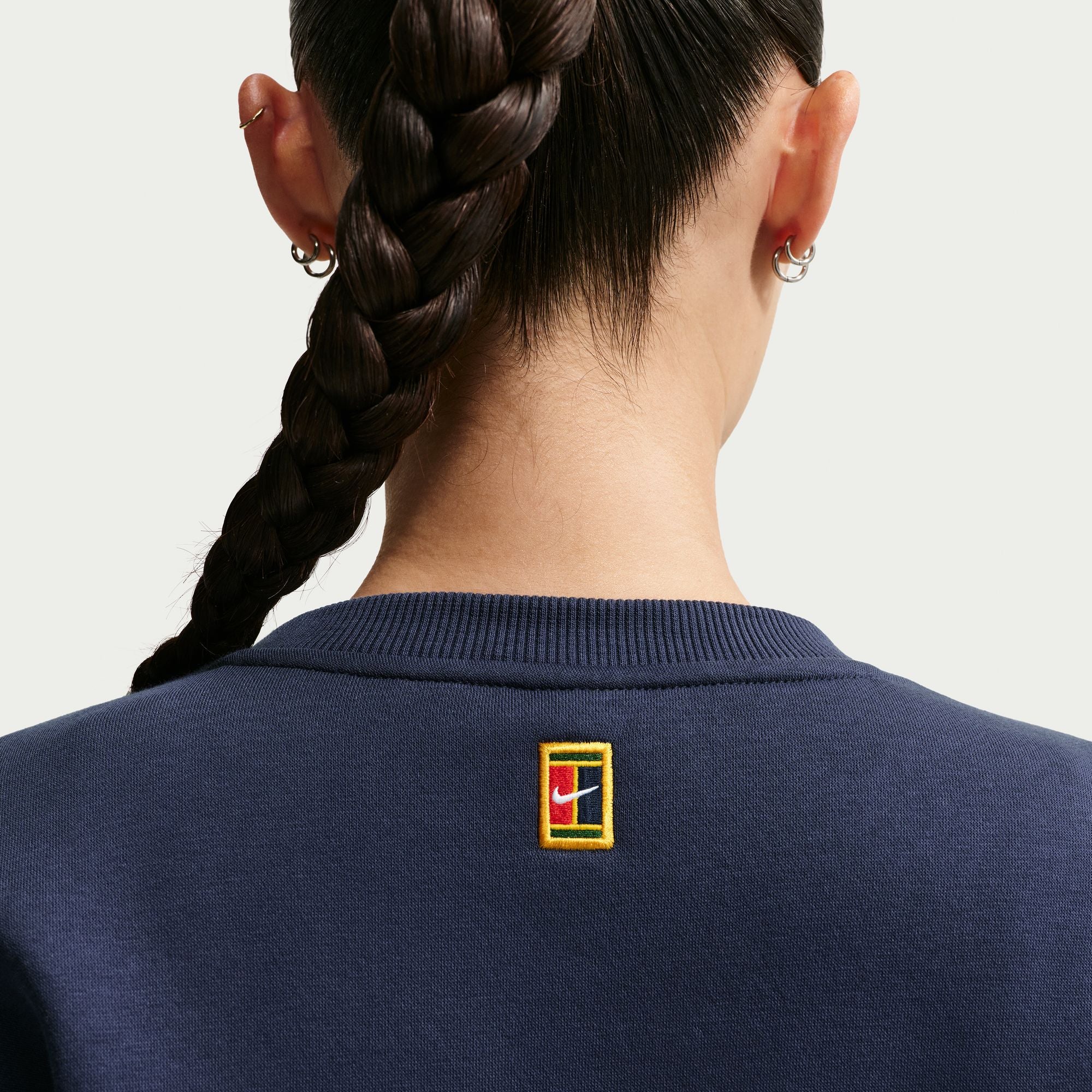 NikeCourt collectie Tennis top met ronde hals voor dames in Midnight Navy/Sail
