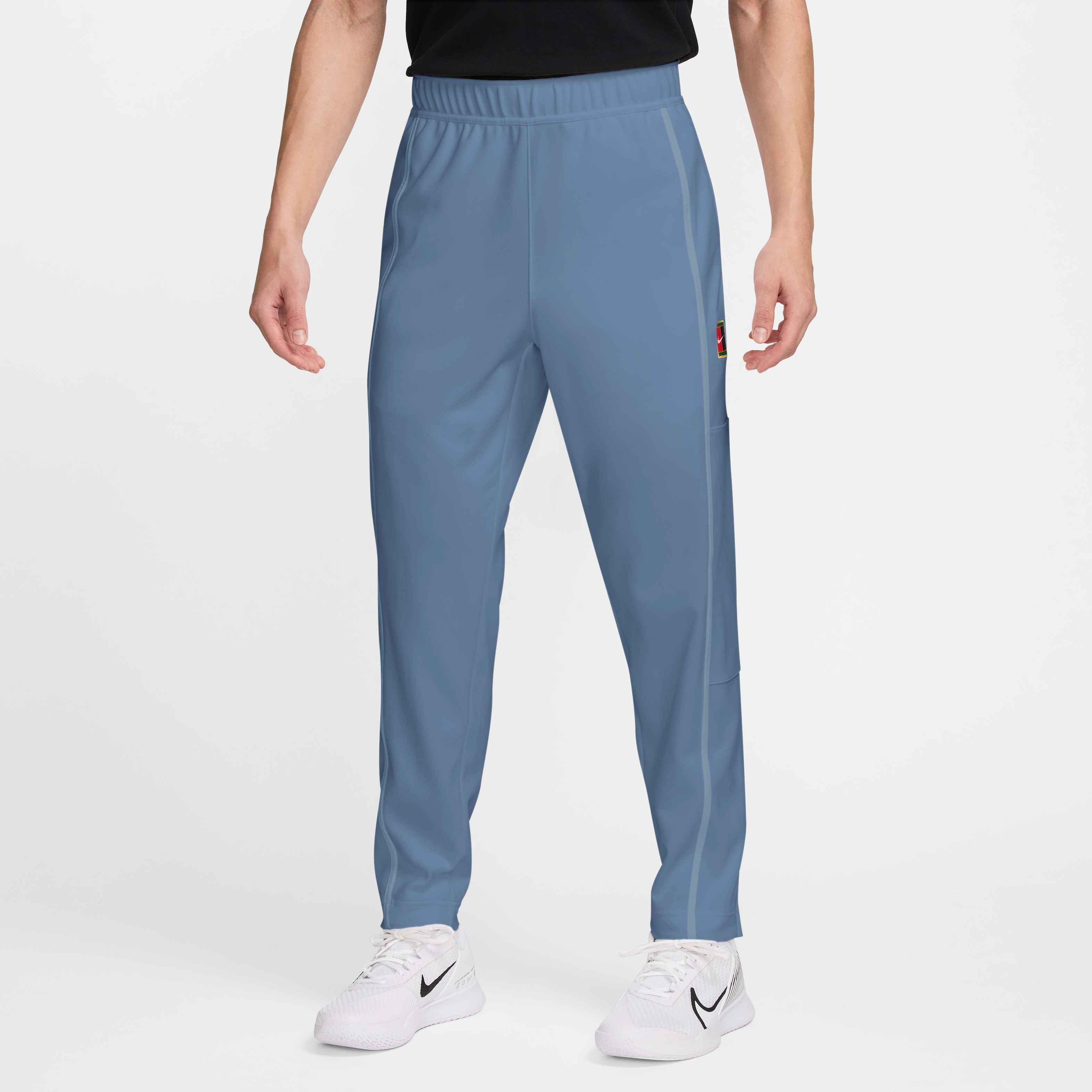 NikeCourt Heritage Tennisbroek voor heren in Work Blue