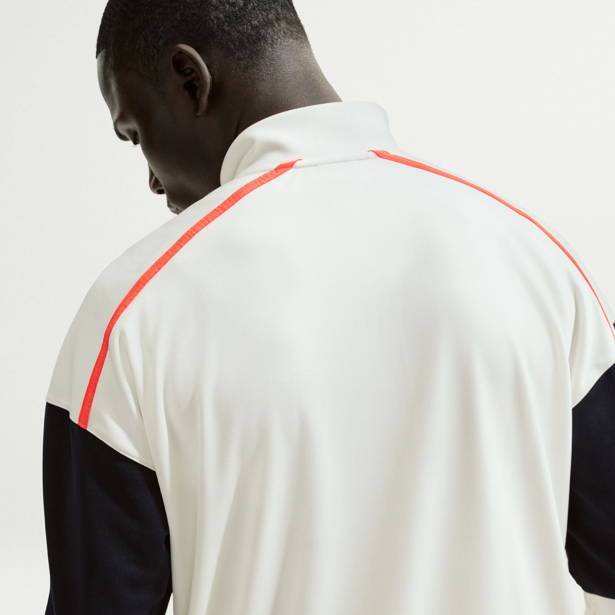 Nike Men's Court Heritage Tennis Jacket in Sail/Turf Orange