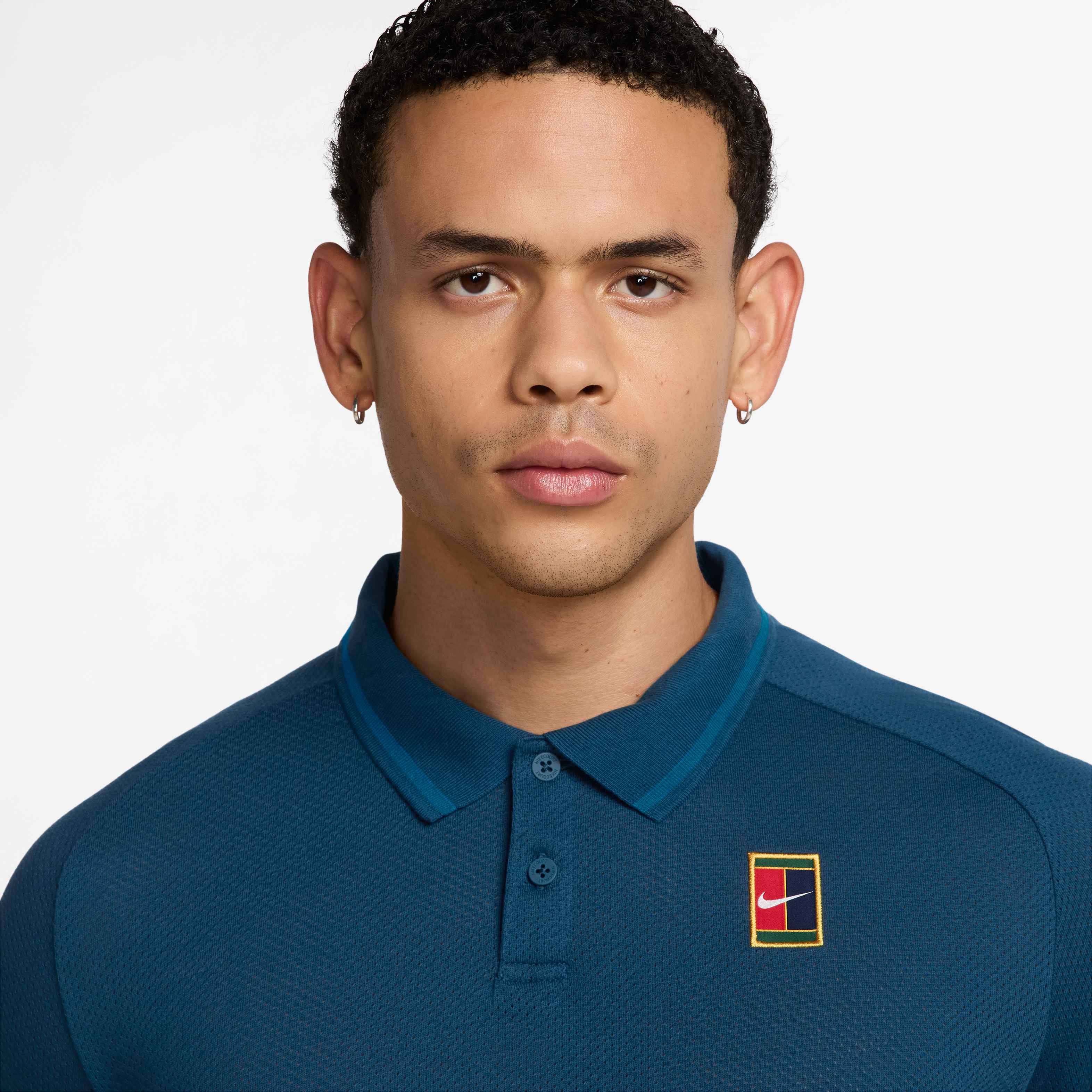 Nike Men's Court Heritage Tennis Polo in Blue Force/Green Abyss
