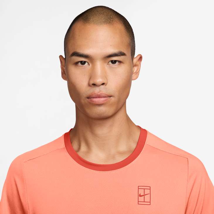 Nike Men's Court Advantage Dri-FIT Tennis Top in ATOMIC PINK/PICANTE RED/PICANTE RED