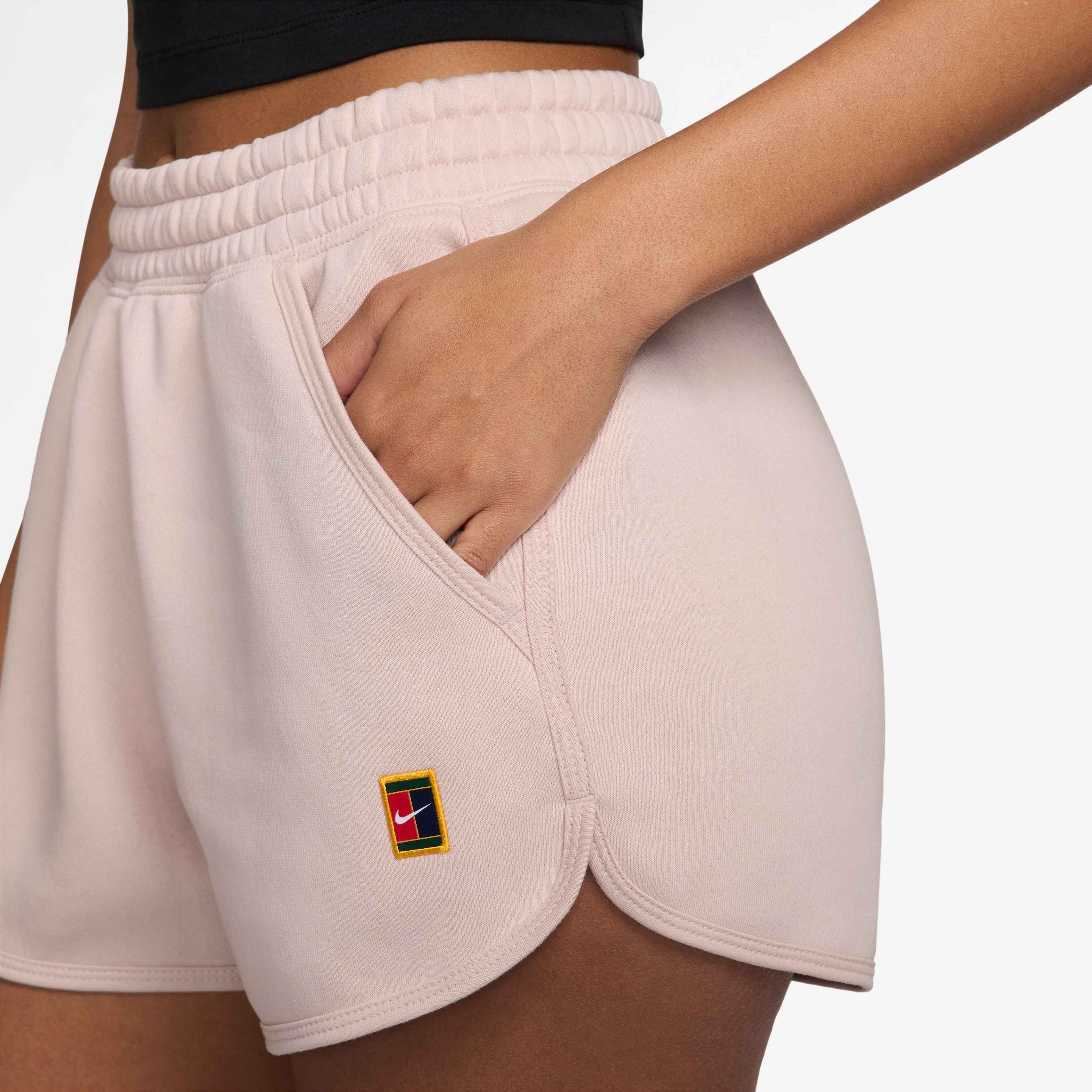 Nike Women's Court Heritage Mid-Rise Fleece Tennis Shorts in Silt Red