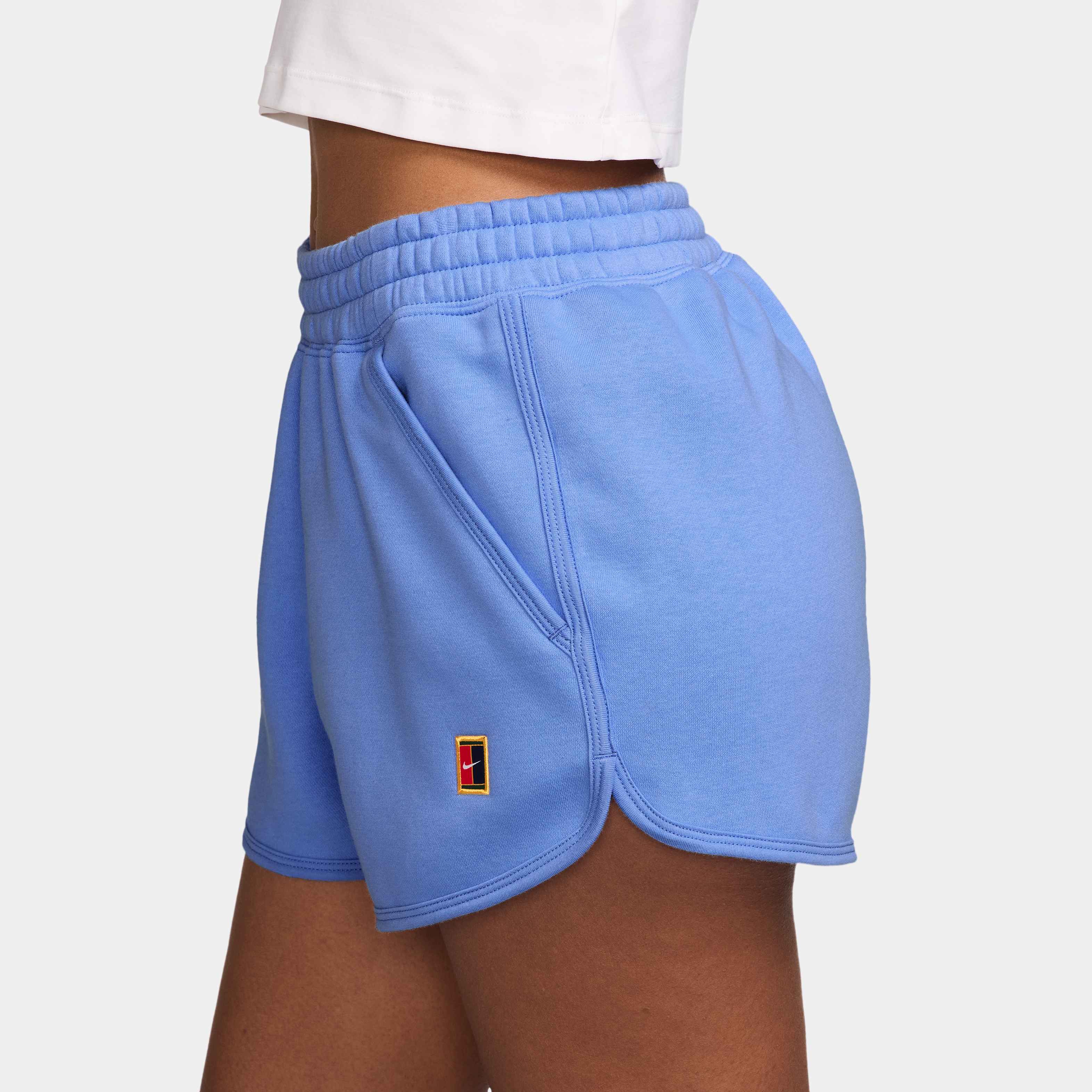 Nike Women's Court Heritage Mid-Rise Fleece Tennis Shorts in Royal Pulse